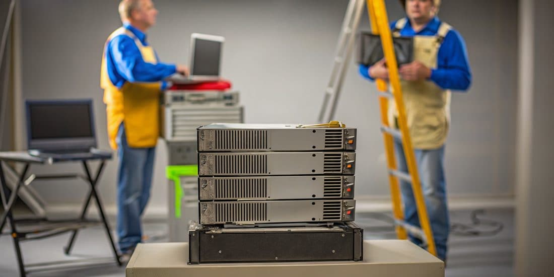 Decommissioned enterprise IT equipment staged for secure recycling